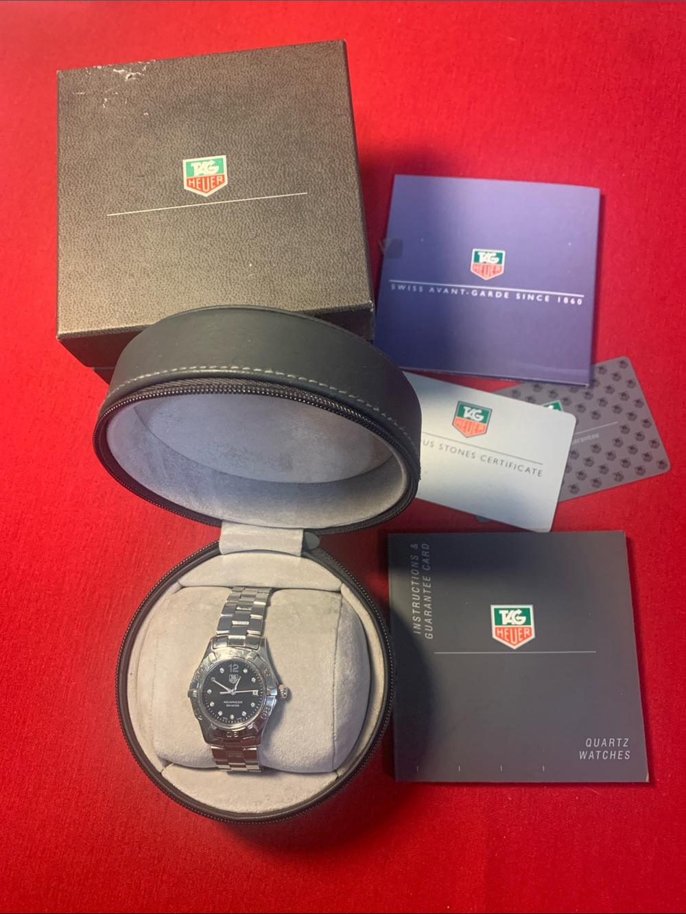 Tag Heuer Aquaracer Diving Watch with a black dial and diamond detailing - Picture 1 of 13